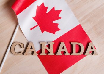Flag of Canada, the word Canada in wooden abstract letters