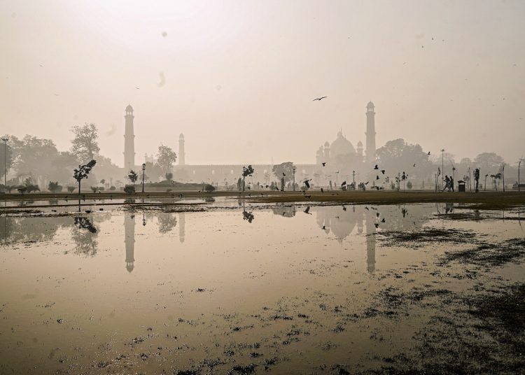 Reflection of Badshahi mosque in water, architecture, Mughal era buildings, Lahore, city, dawn.