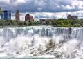 The American side of Niagara Falls with scenic river falls , parks and hotels