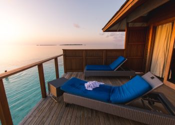 Beautiful tropical Maldives resort hotel and island with beach.